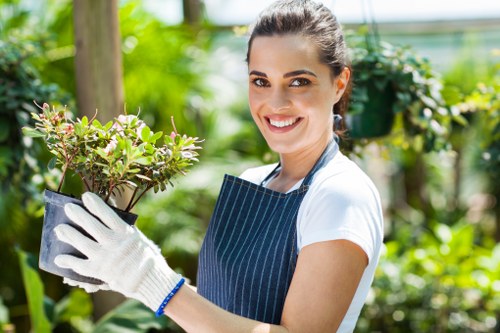 Health and safety review for landscapers with tools, waste bags, and protective gear